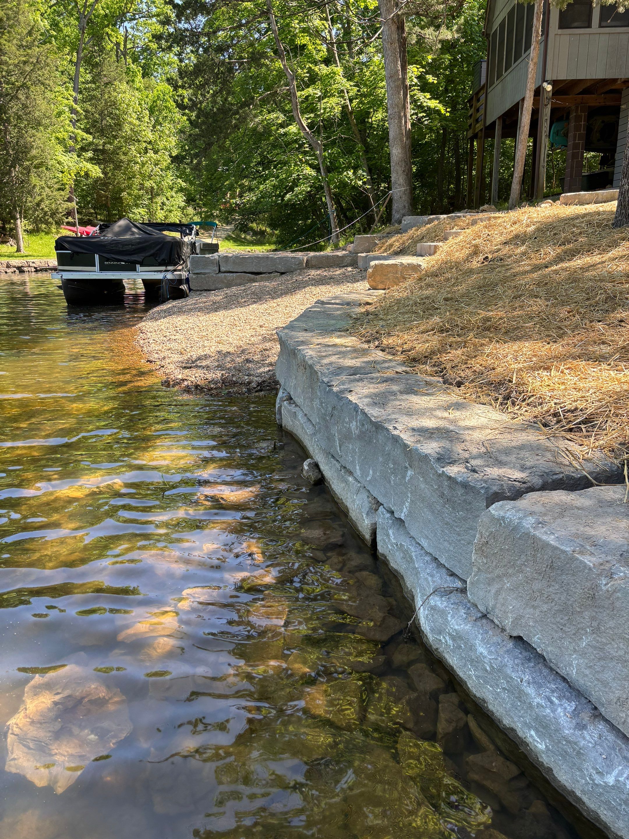 Lakeside Deck & Fire Pit by Loch Ness Landscaping, LLC