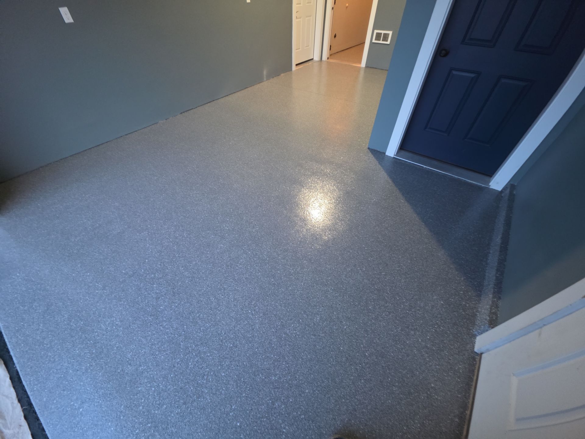 Garage Transformation using Turquoise Hybrid by Croc Coatings, LLC