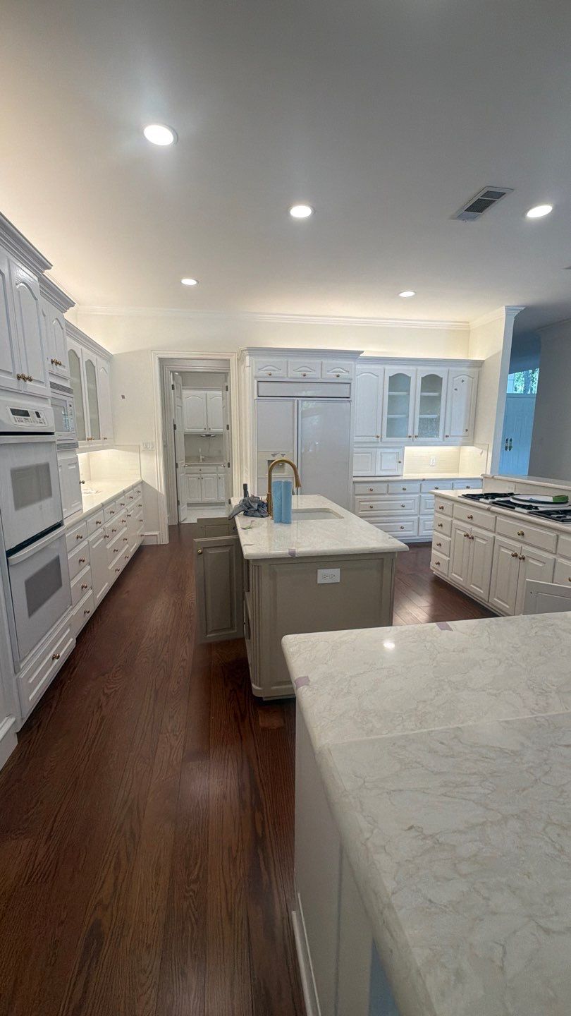 Luxury Interior Renovation with Marble Flooring and Custom Master Suite by Springtree Restoration
