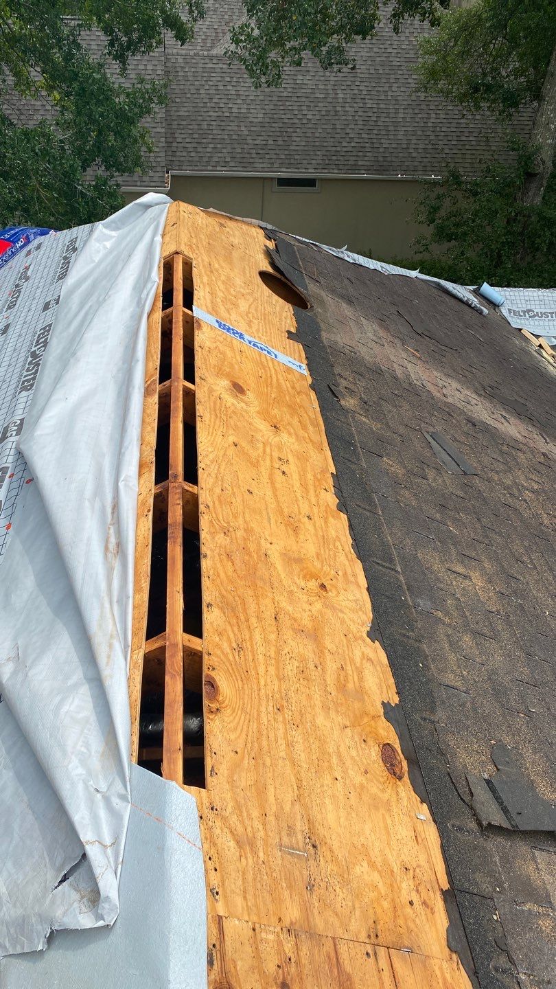 Residential Roofing Installation using Roof Replacement by American Roofing & Construction LLC