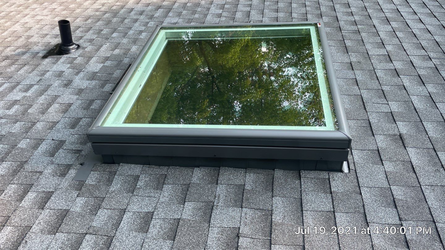 Deckhouse Roof Replacement by American Home Contractors