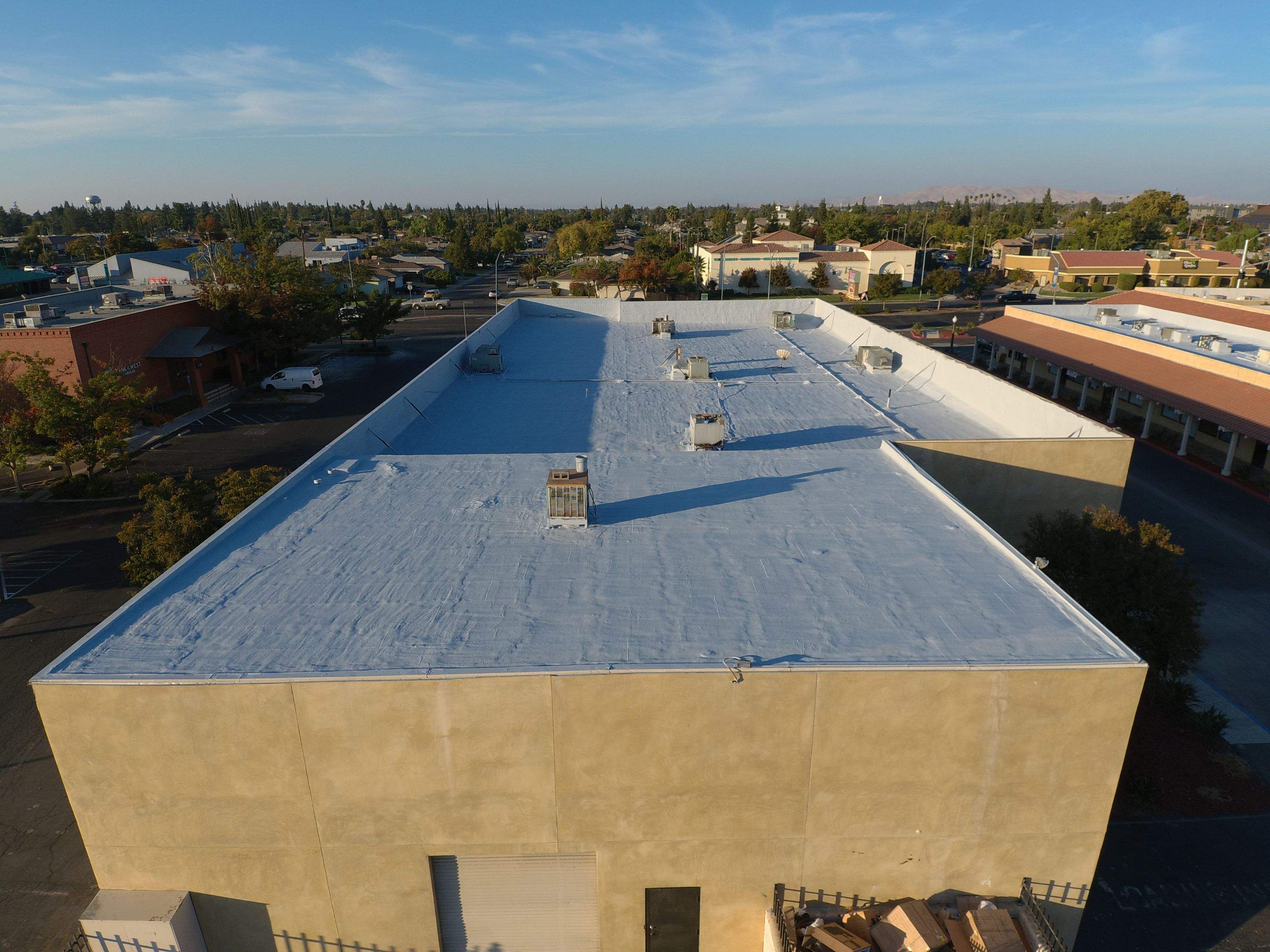 Reburbish existing spray foam job by Straight Edge Roofing Inc