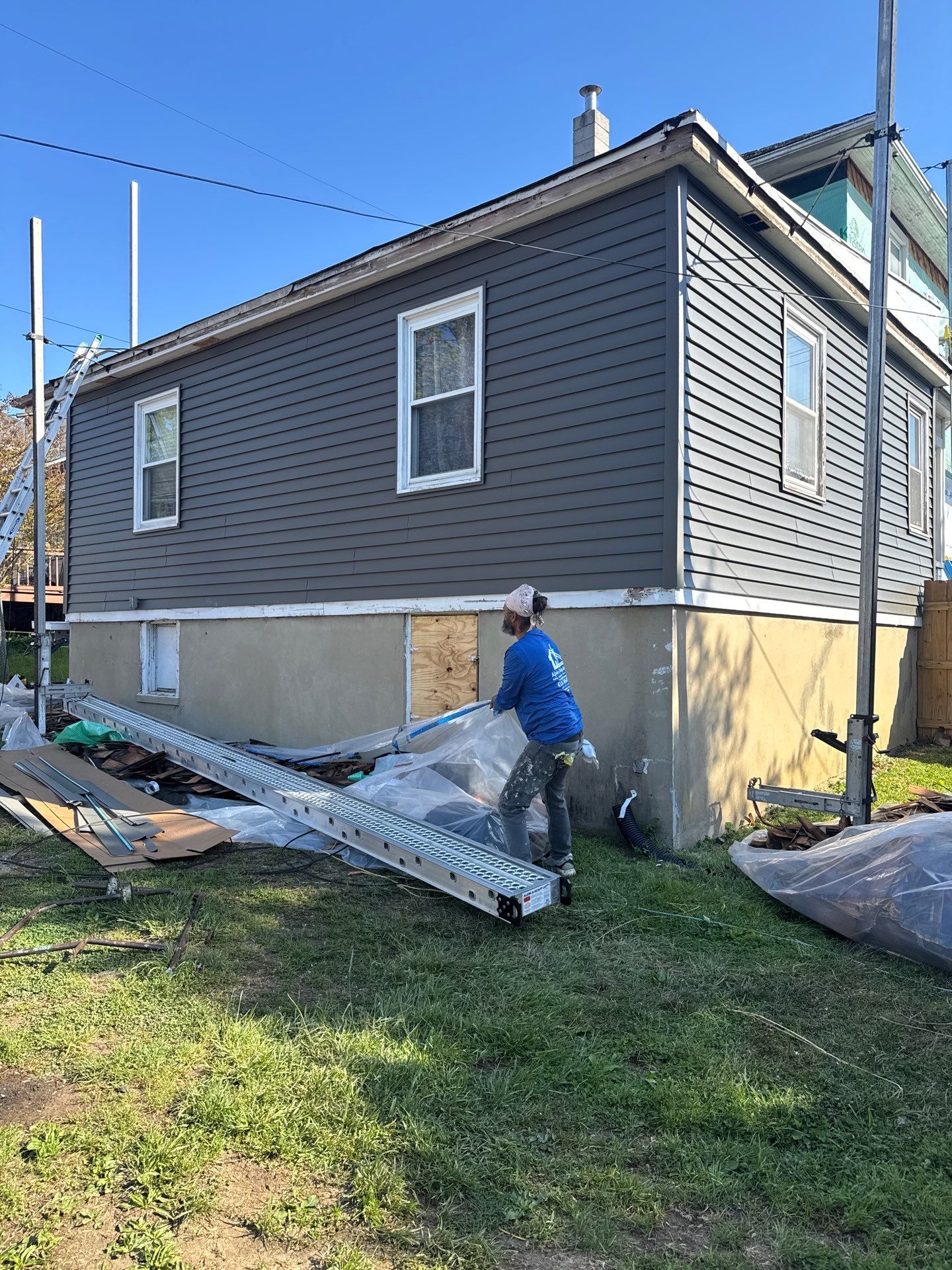 New siding & New Gutters by Alpha Design Services