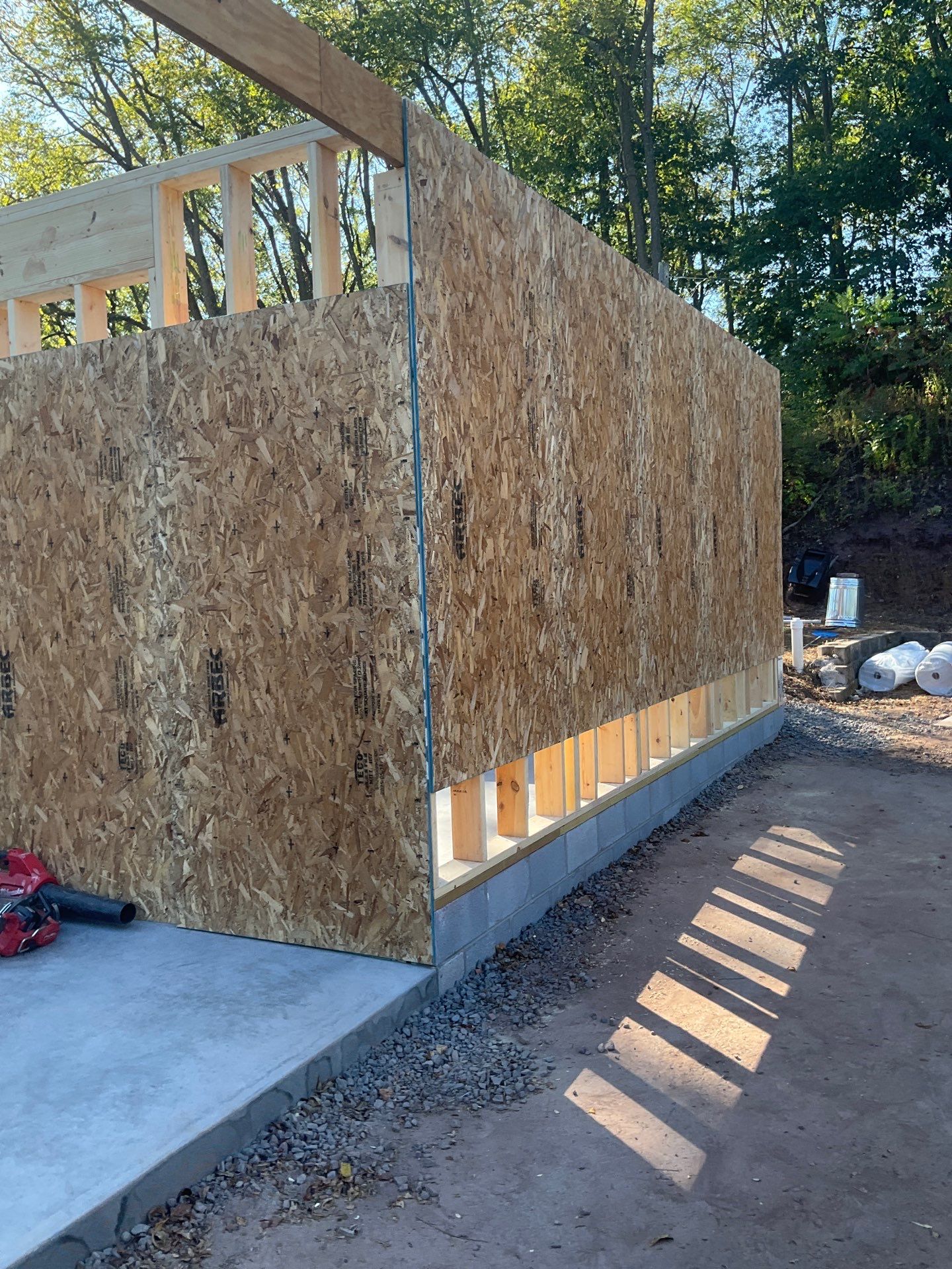 Detached Garage Construction with Vinyl Siding and Metal Roof by Esh Builders