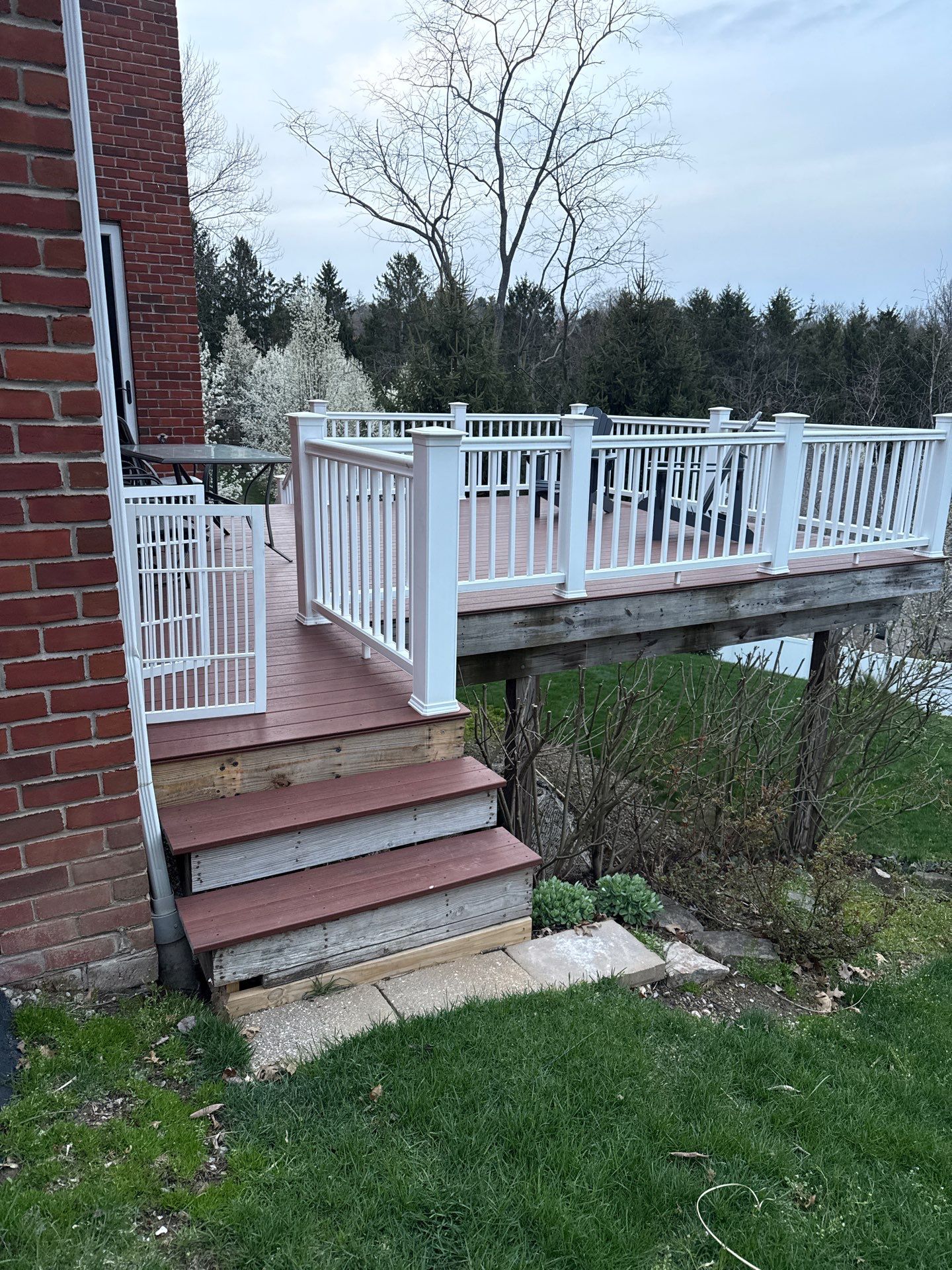 Deck extension  by Cousins Roofing Siding & Decks