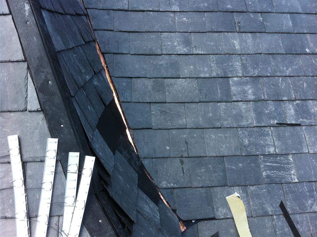 Historic Building ROOF REPLACEMNT with GAF TruSlate  on steep slop and Versico 60mil TPO on flat roof by Gorilla Exteriors Contracting, LLC
