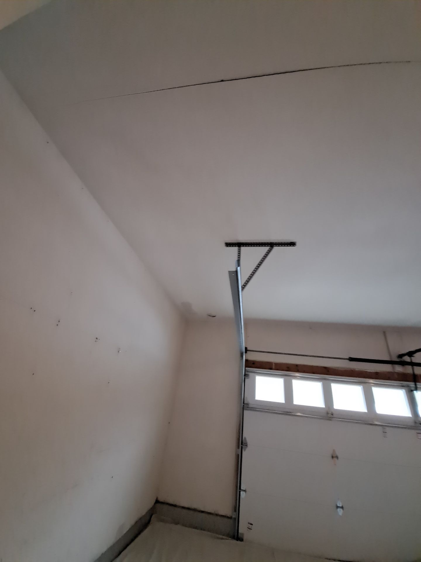 Garage dry wall repair/ re-texture, re-paint by Gordon Painting