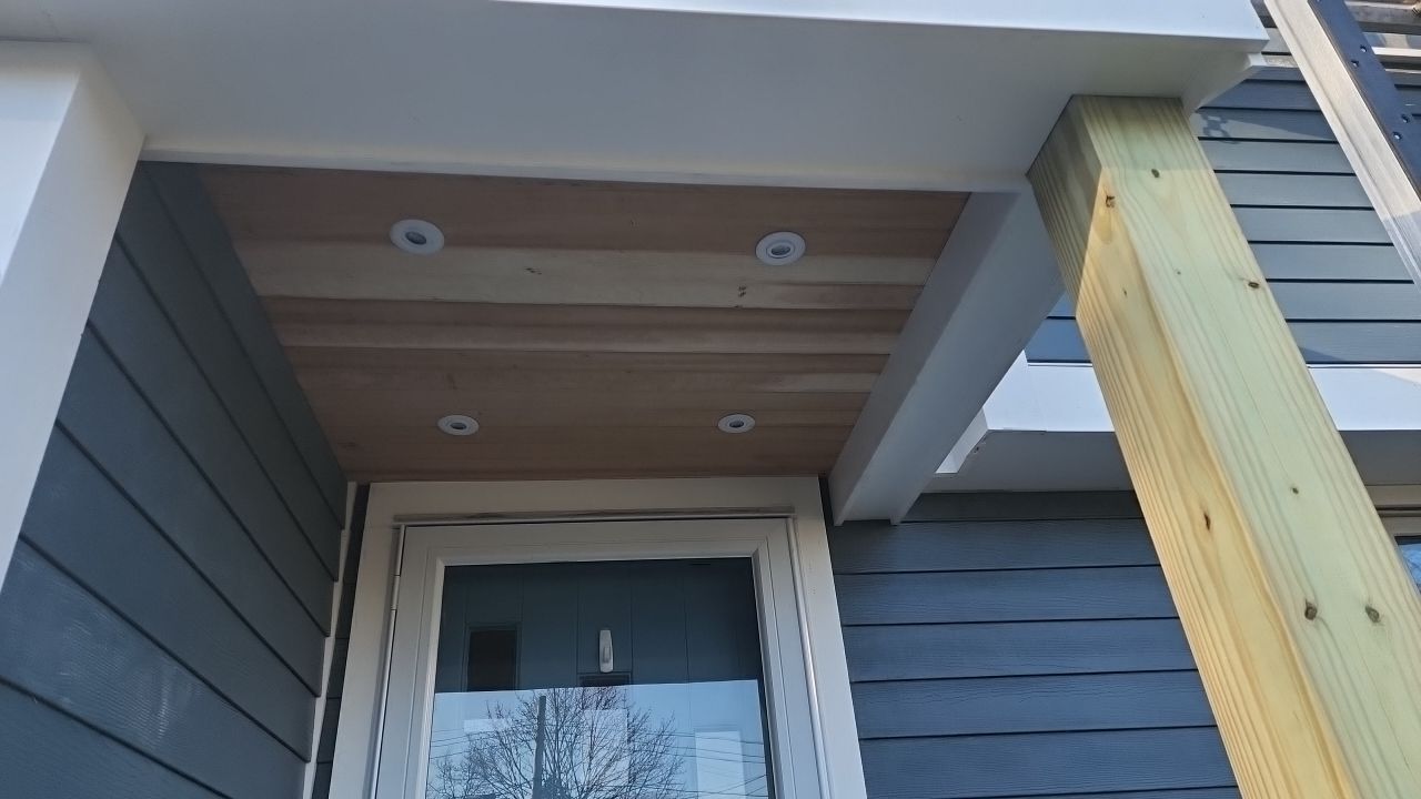 James Hardie siding, new metal roof and couple windows being installed. by UBrothers Construction
