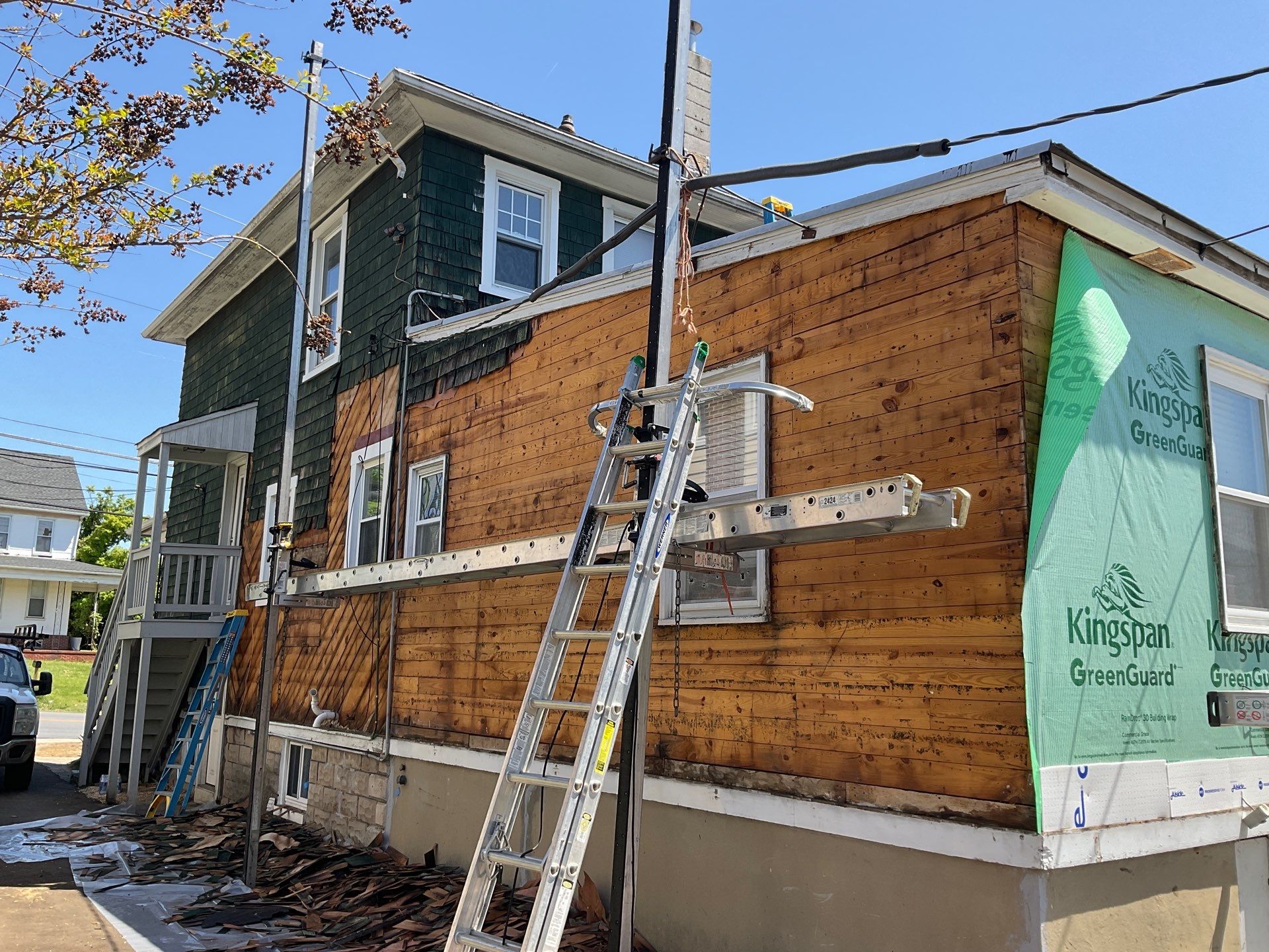 New siding & New Gutters by Alpha Design Services