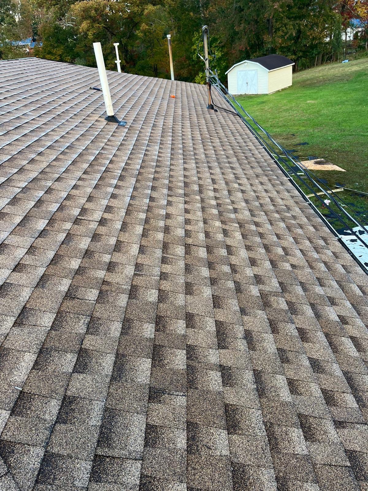 Residential Roofing Installation using GAF Timberline HDZ Shakewood by Rainstoppers Roofing