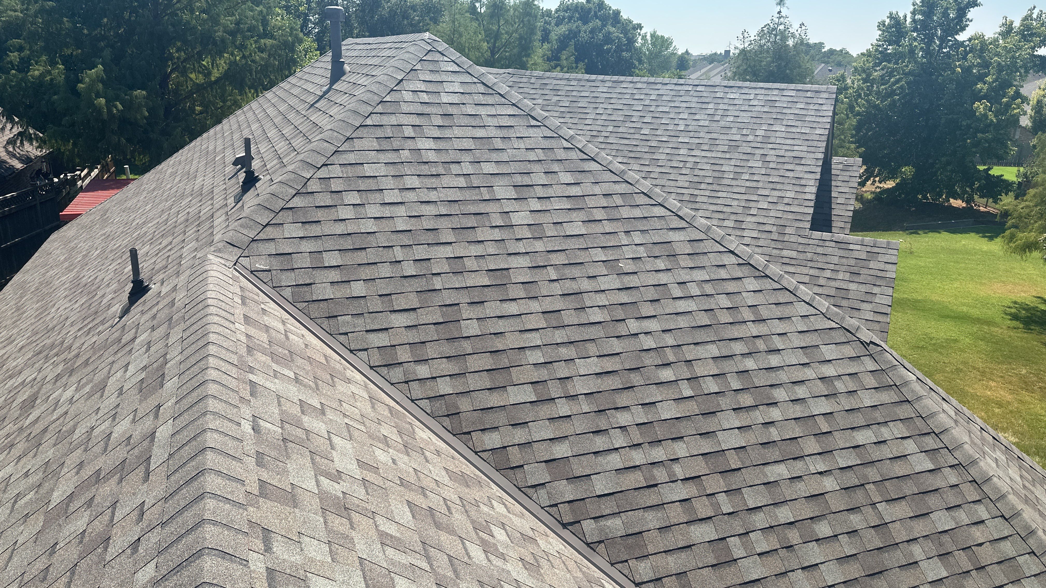 Reroof using Owens Corning Duration Storm IR in Driftwood by Castillo Roofing