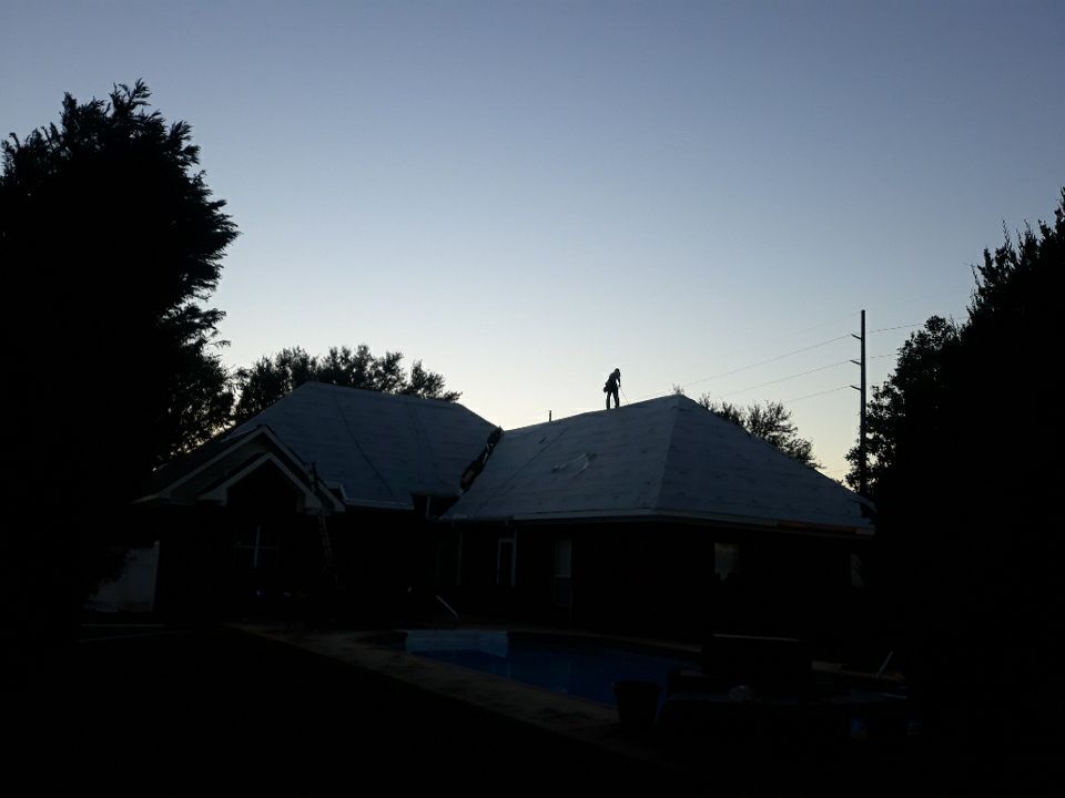 Residential Roofing Installation using Roof Replacement by American Roofing & Construction LLC