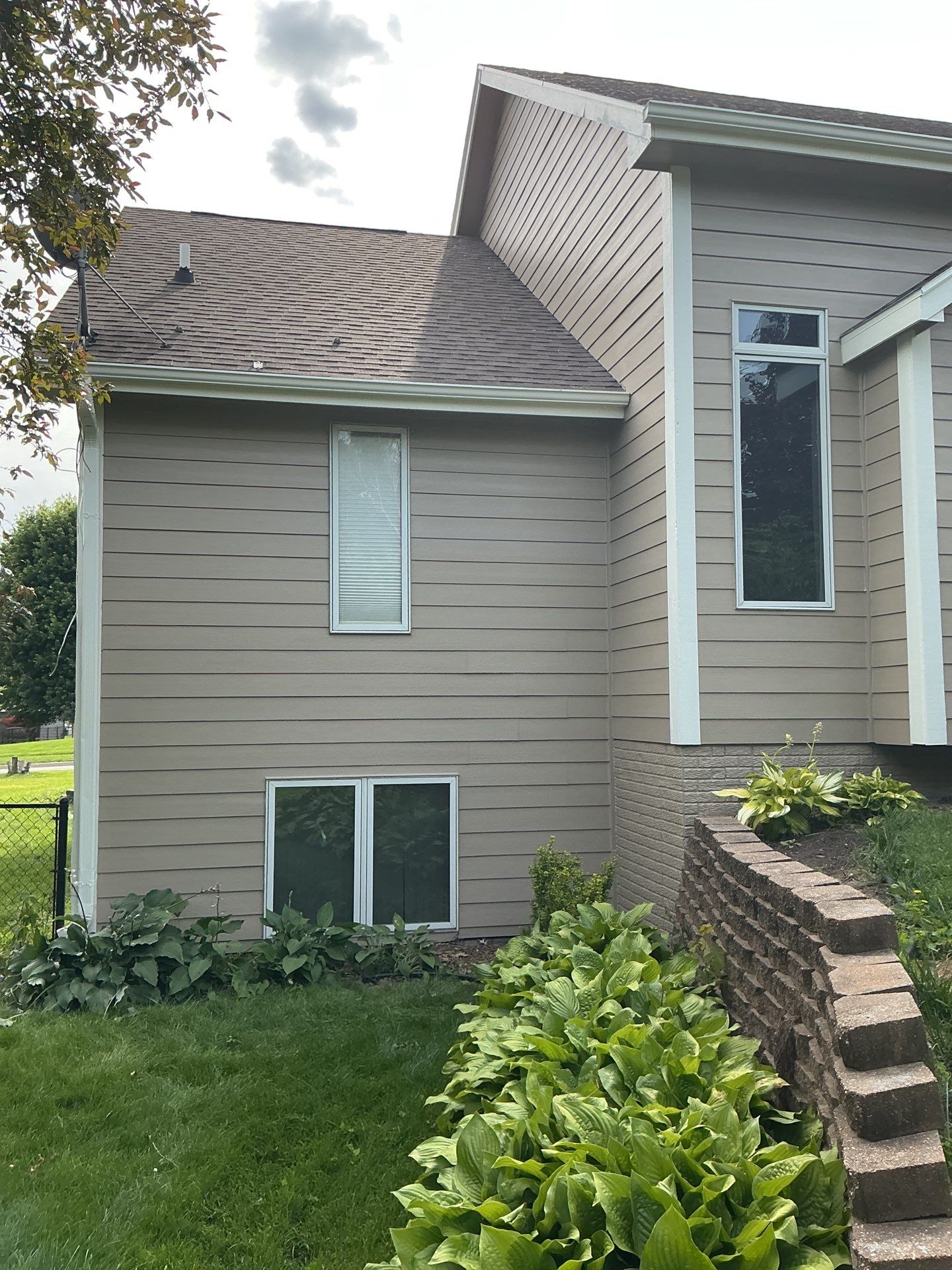 Residential Exterior Repaint  by Midwest Paint LLC