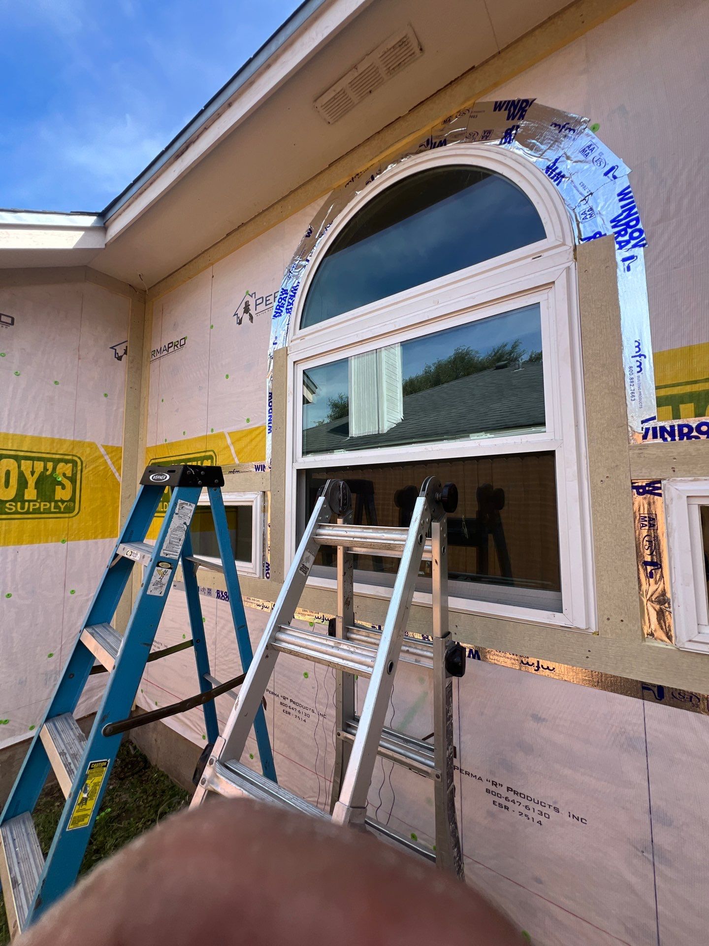 Windows with a side of Siding by Bayfront Roofing and Construction