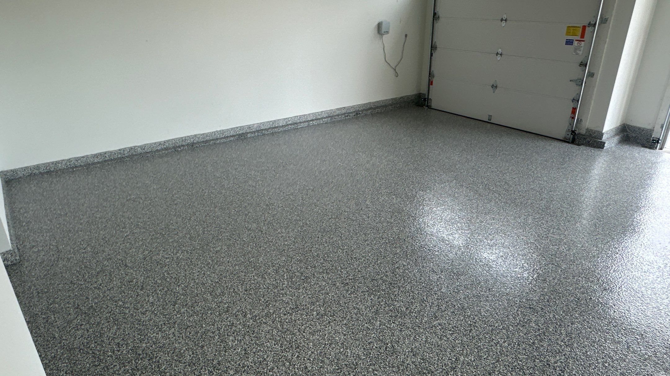Stonhenge flake floors just look great. Wow!!! by Banner Garage