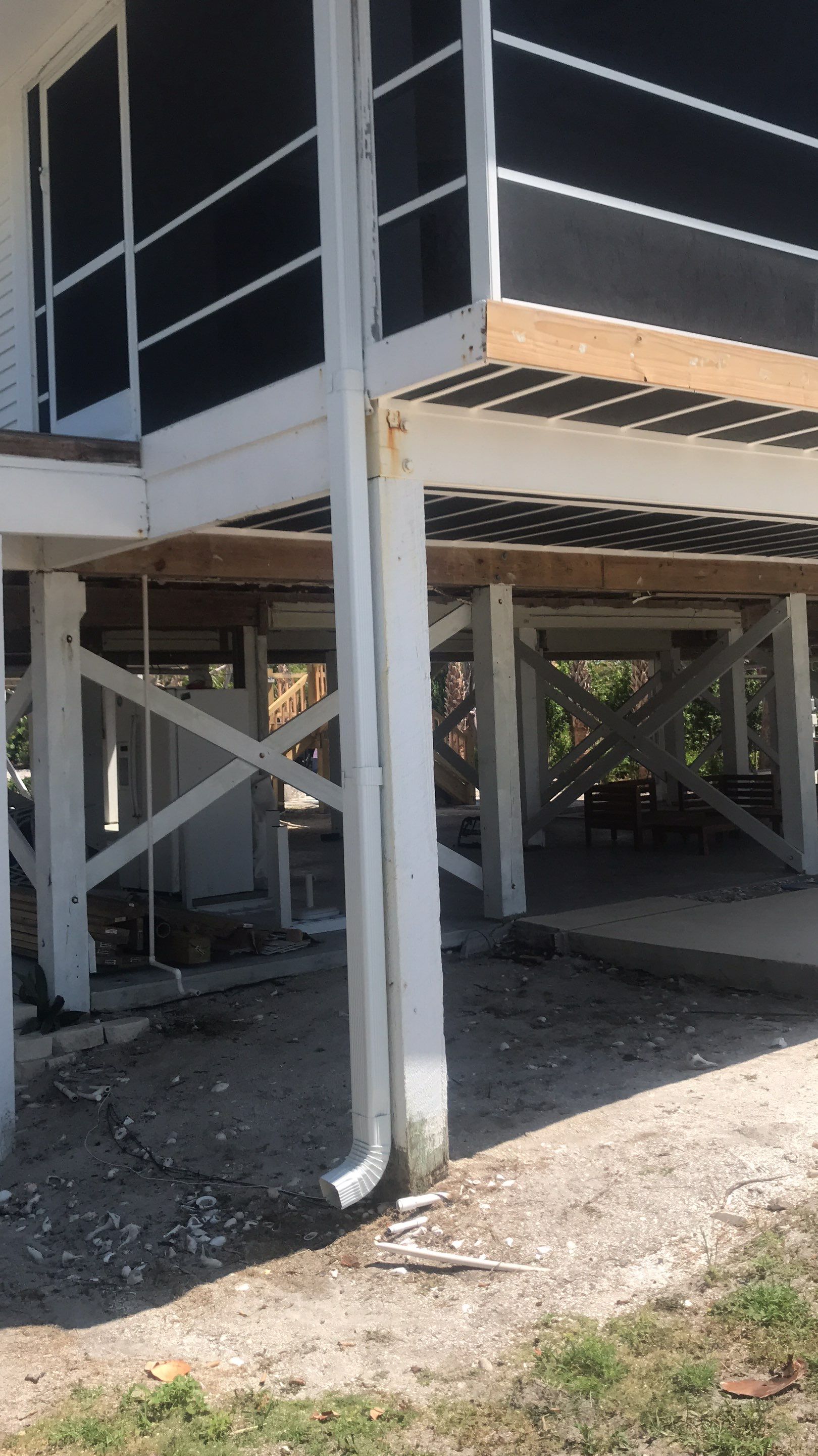 Downspout Installation using Downspout Extension in Sanibel FL by Gutter Professors