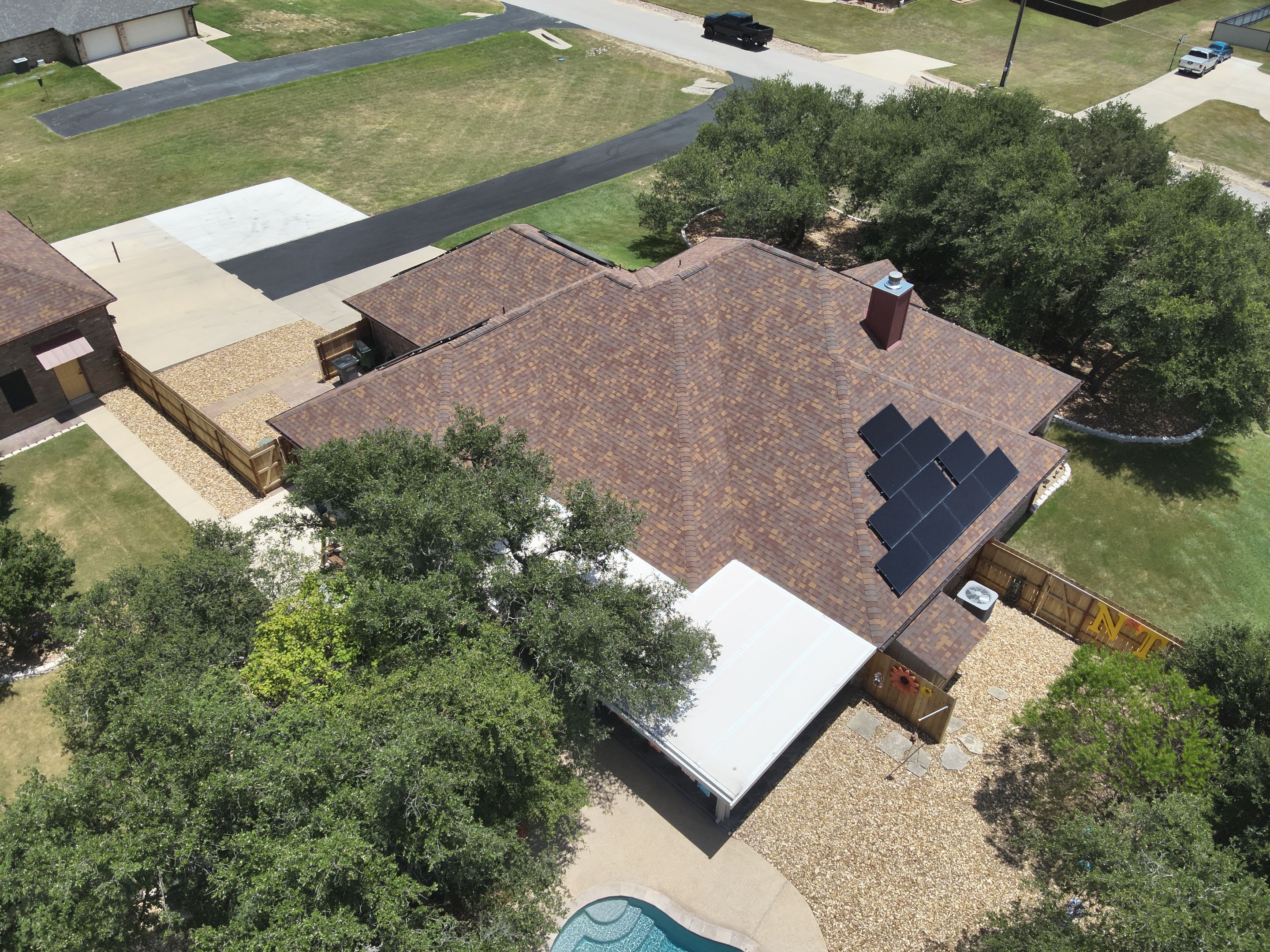 Residential Roof Replacement with Owens Corning - Duration - Sedona Canyon by Action Exteriors Austin