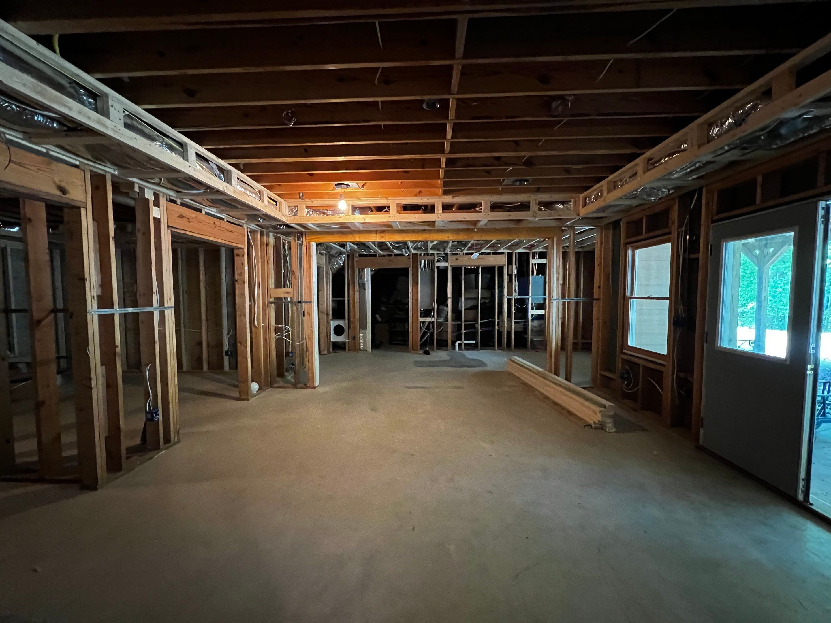 Custom Basement Remodeling With Home Theater and Bar in Woodstock by Swift Home Renovations