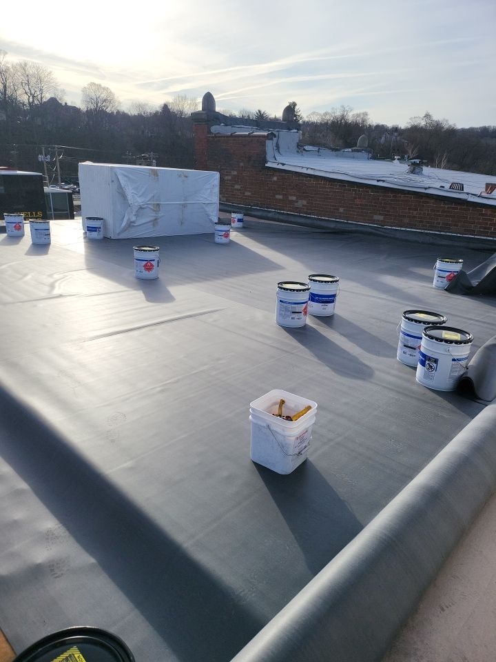 Commercial Roofing Installation using EPDM  by A Plus Exterior