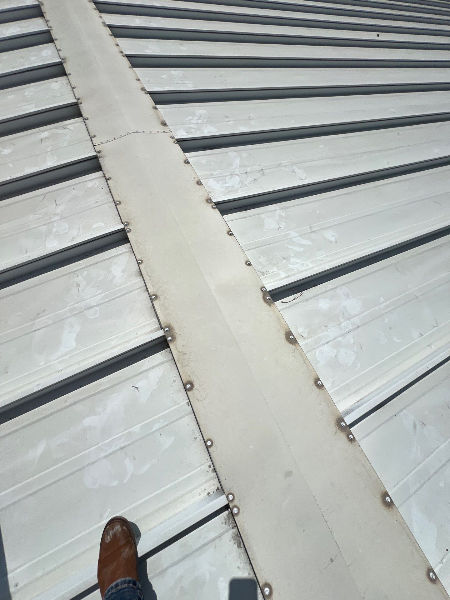 Commercial Roofing Repair using Metal by Roof Repair Company