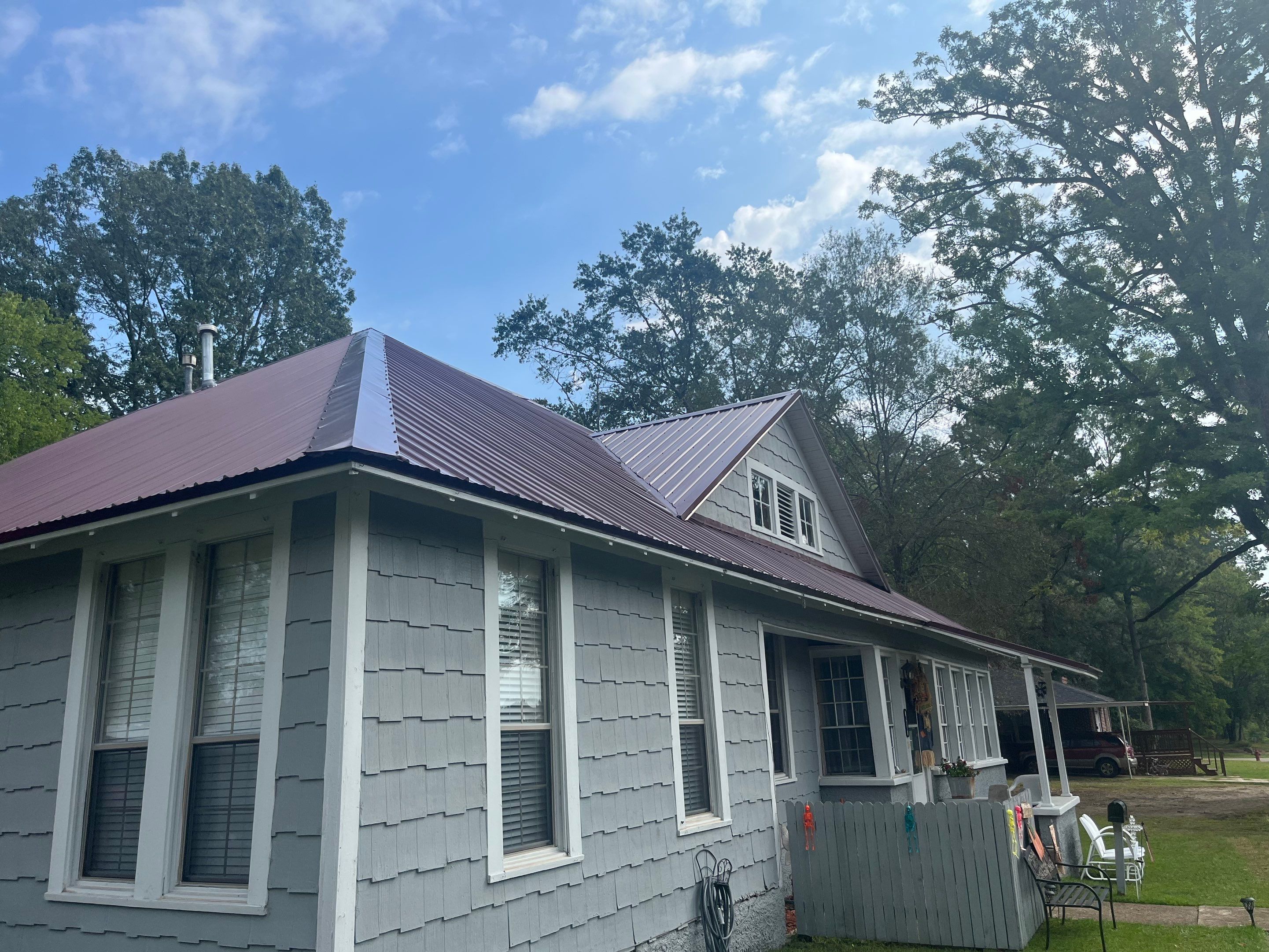 Residential Metal Roof Replacement using Reed's Metals: Colored Residental Panel (Burgundy) by Hostetler Roofing