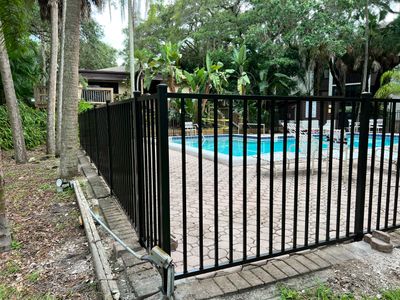Sarasota, FL Commercial Aluminum Pool Fence & Shadowbox Wood Fence 