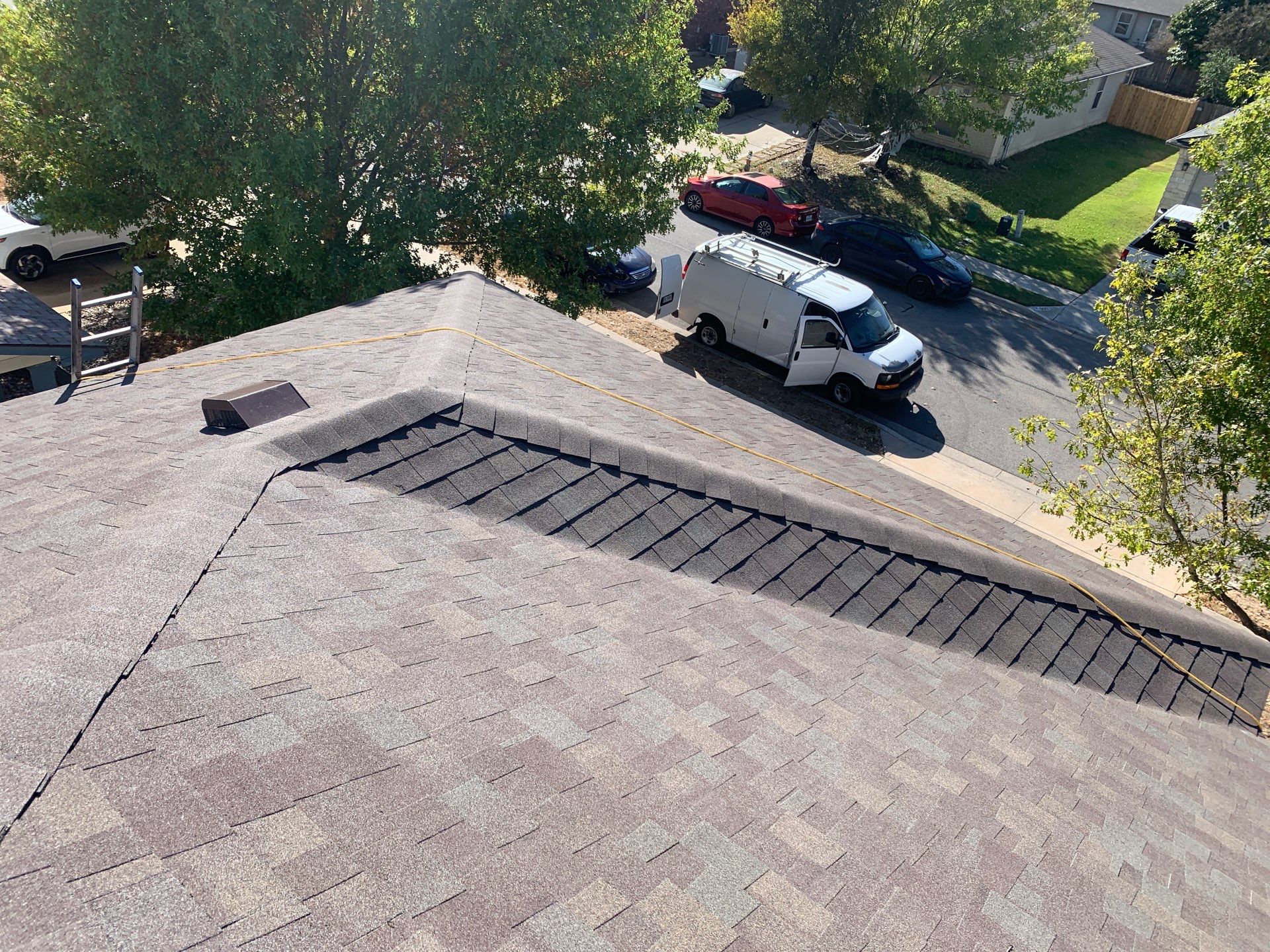 Asphalt Shingle Roof Replacement and Hail Damage Restoration in Hutto by Caliber Restoration LLC