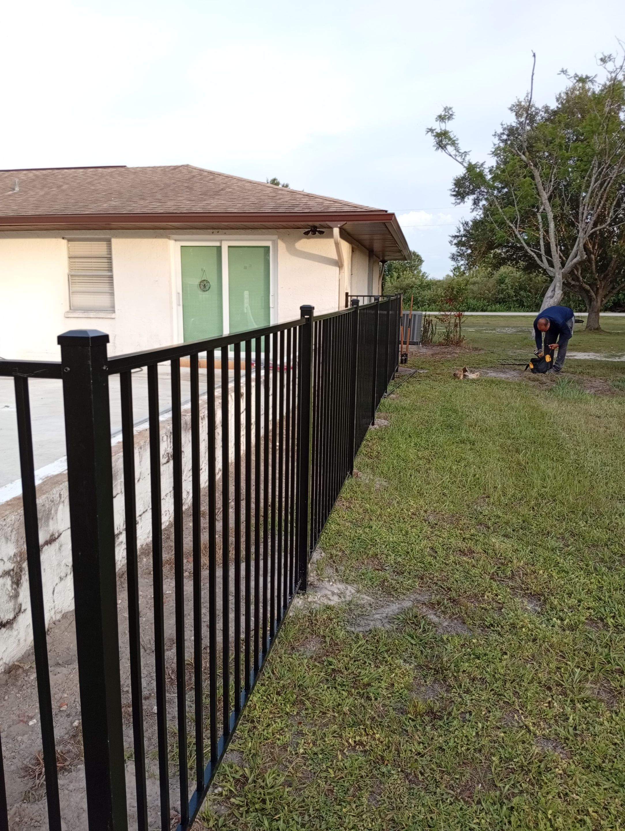 Black Aluminum Pool Safety Fence Installation in Punta Gorda by True Fence LLC