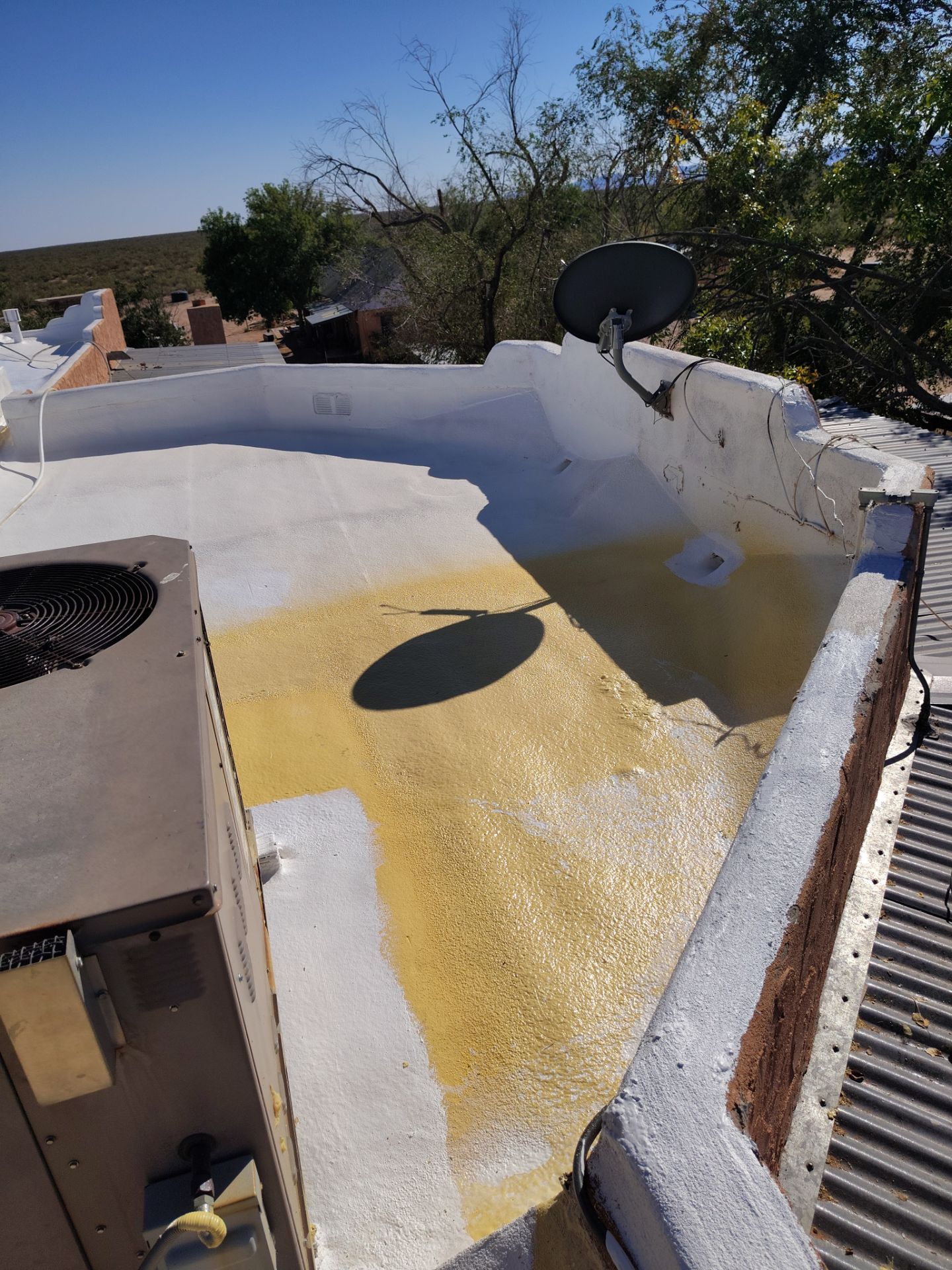 Residential roof application by SPF Services 