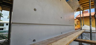 Microtopping over Exterior Walls