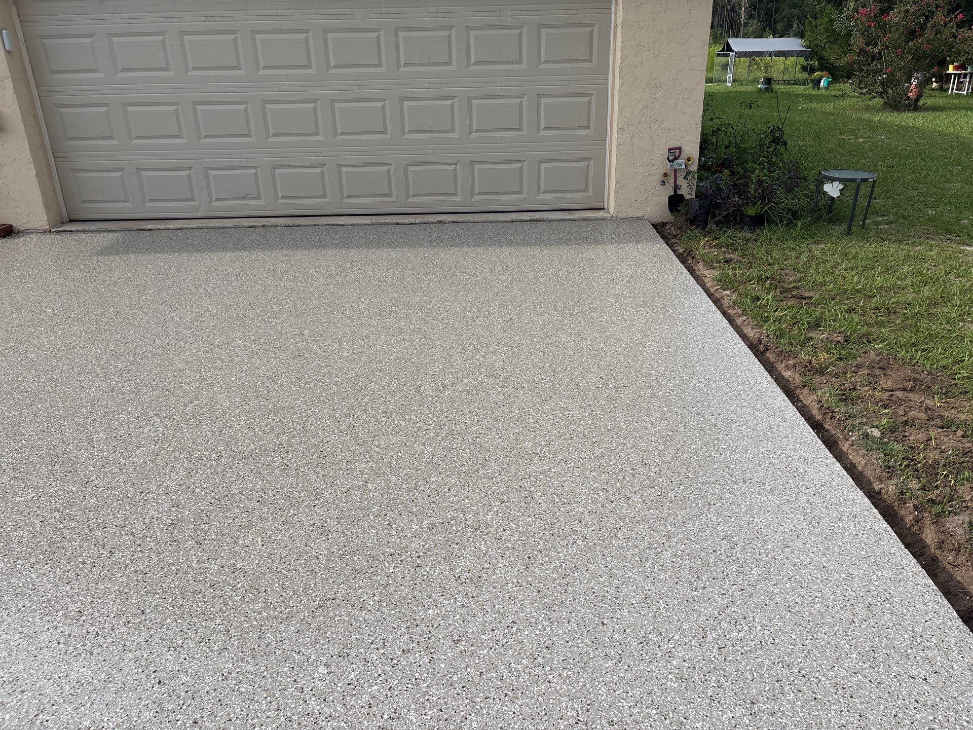 Pool Deck and Driveway in Pebble Beach by Cross Creek Concrete Coatings