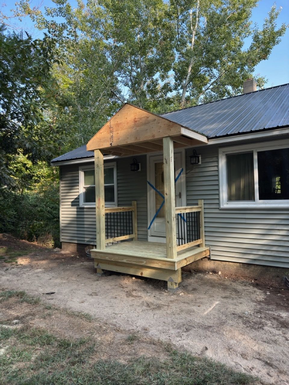 Siding & Front Entry Deck in Wolfeboro, NH by CML Roofing and General Contracting