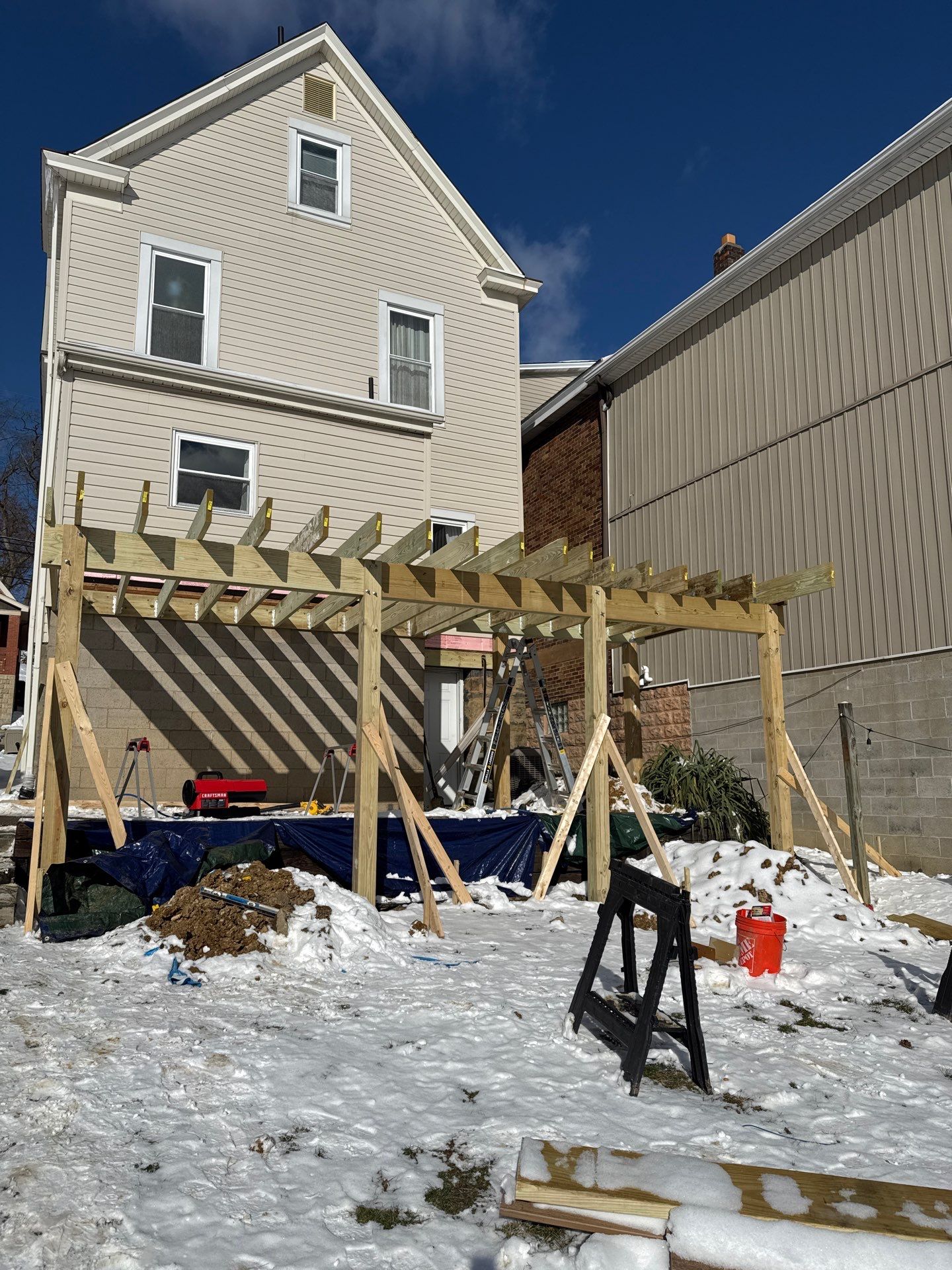 Deck and door by Cousins Roofing Siding & Decks