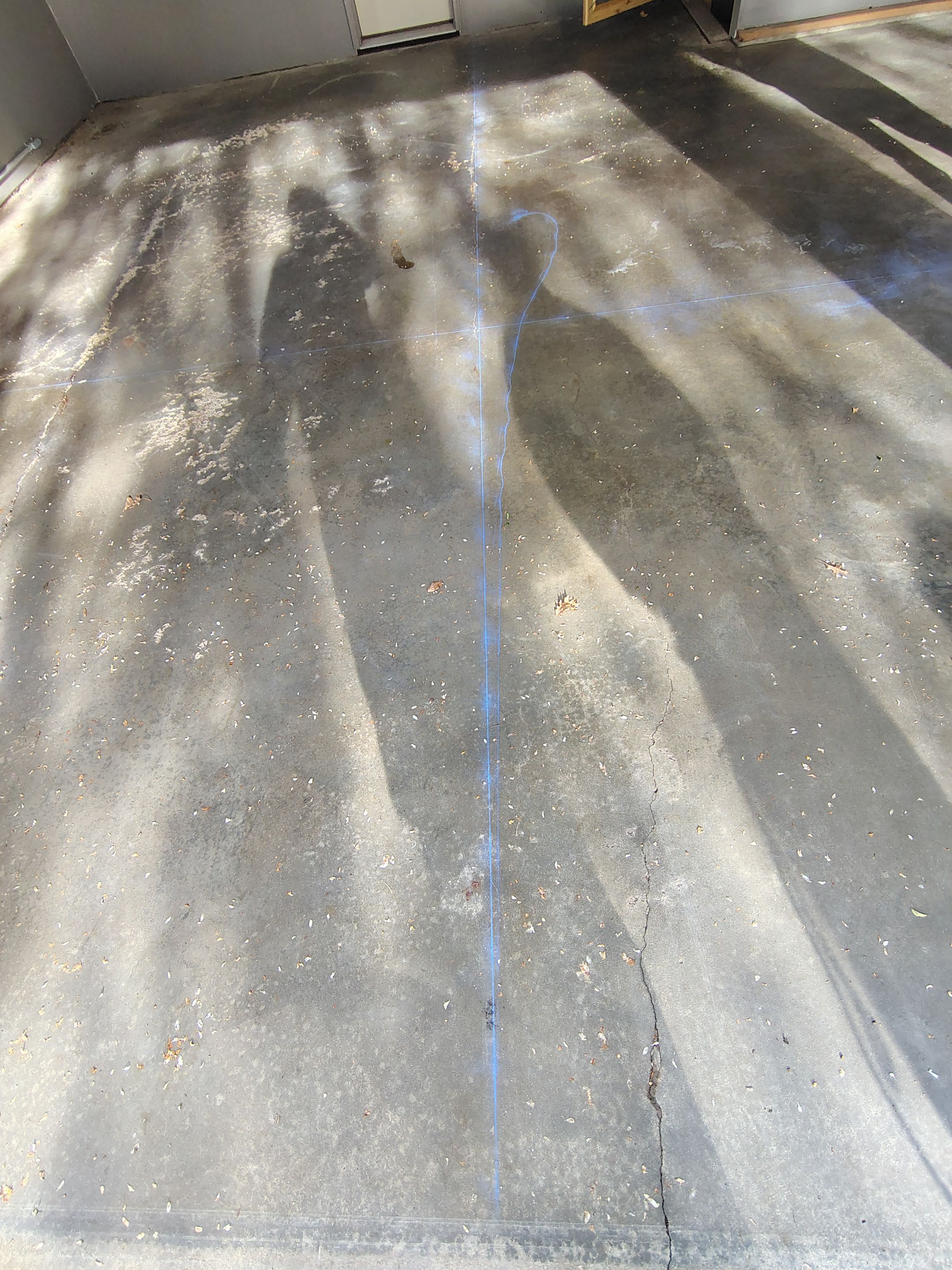 Garage Floor Concrete Coating and Crack Repair in Sioux Falls by Select Painting, Coatings & Garage Cabinets