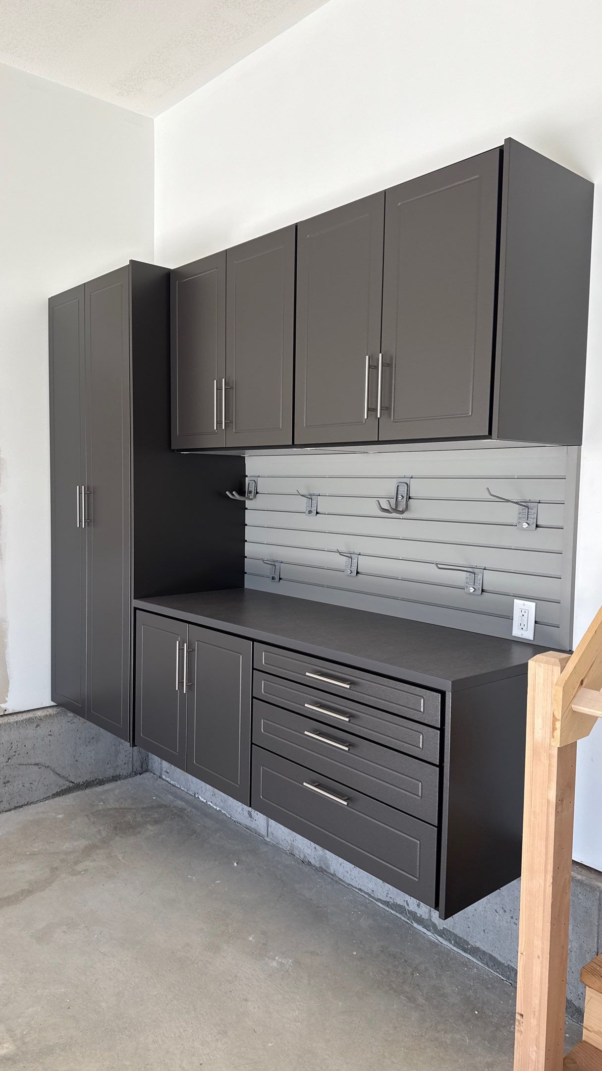 Nice Clean Look With These Pewter Cabinets by Banner Garage