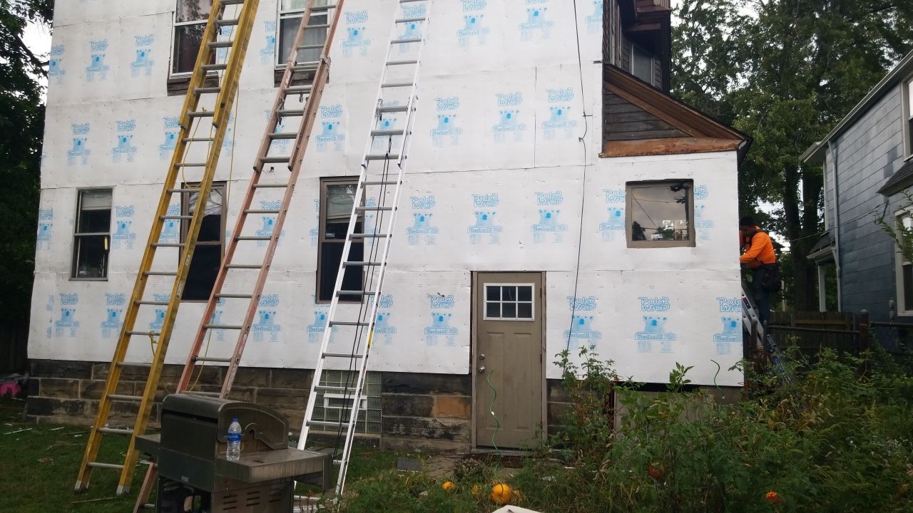 James Hardie Siding on Antique Home by Absolute Roofing and Construction