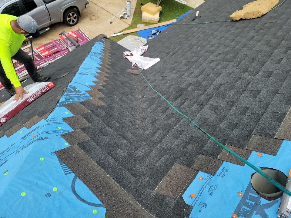 Residential Roofing Installation using Roof Replacement by American Roofing & Construction LLC