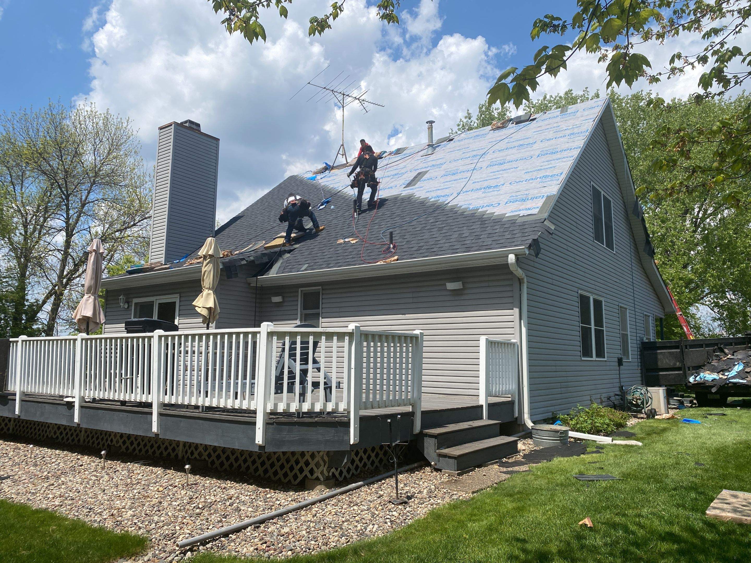 Residential Roofing Installation using Certainteed Landmark Moire Black by MODERN EXTERIOR SYSTEMS