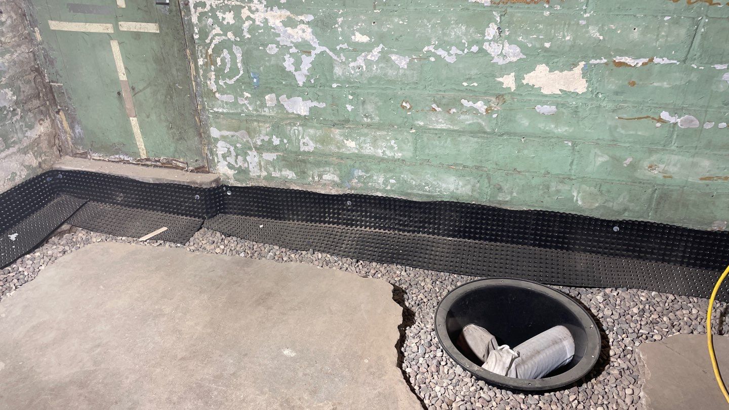 Interior Drain Tile for a South Minneapolis Basement by Waterproofing Northeast