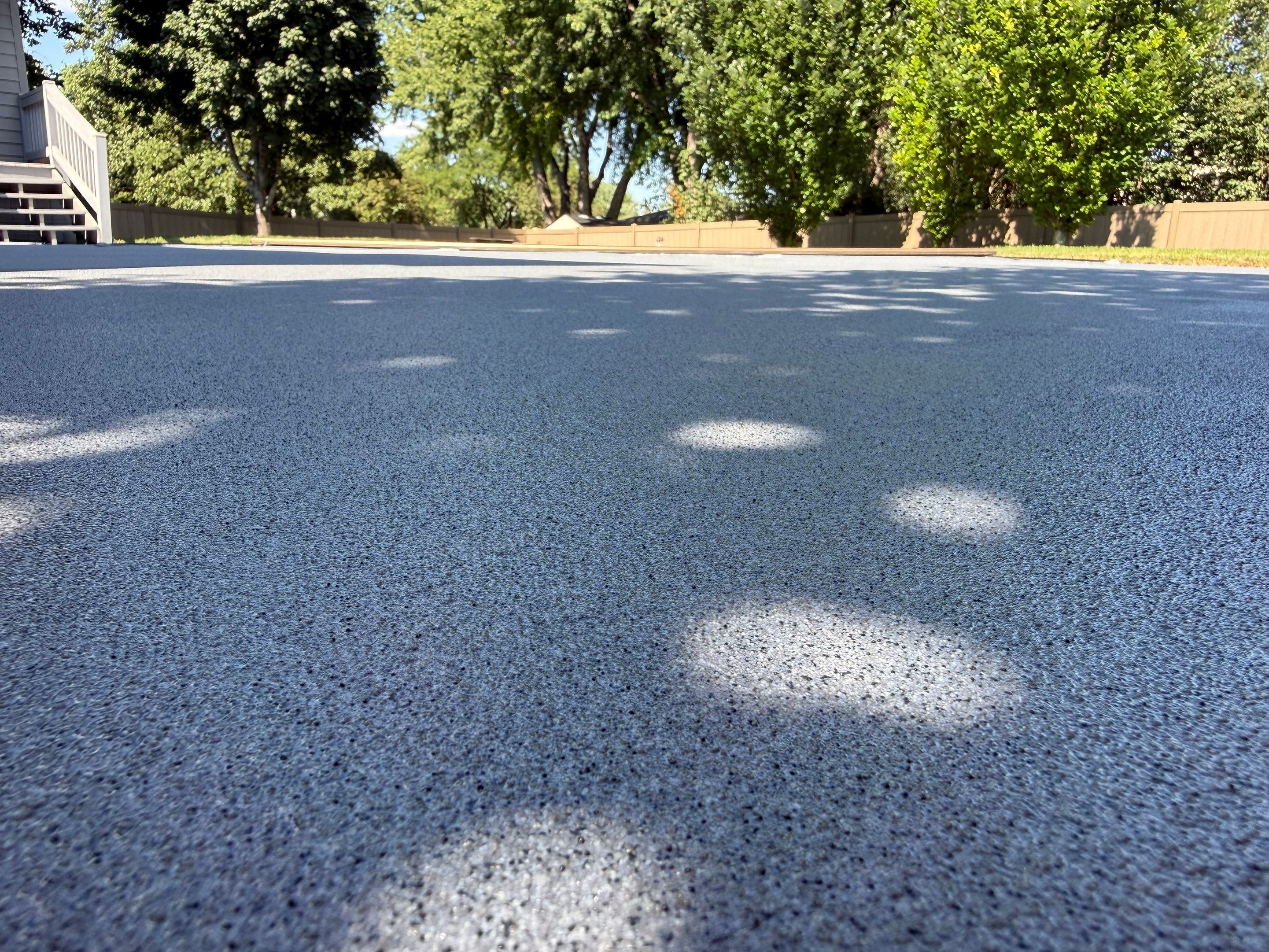 Residential Pool Deck Resurfacing in Sioux Falls by Select Painting, Coatings & Garage Cabinets