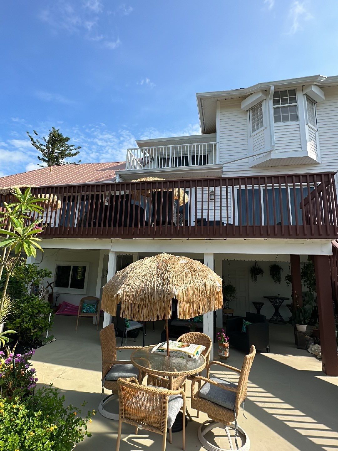 White K-Style Gutters Installed with White Downspouts in Sanibel FL by Gutter Professors