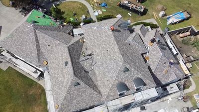 Residential Roof Installation with Hecker Clay Ridge Caps