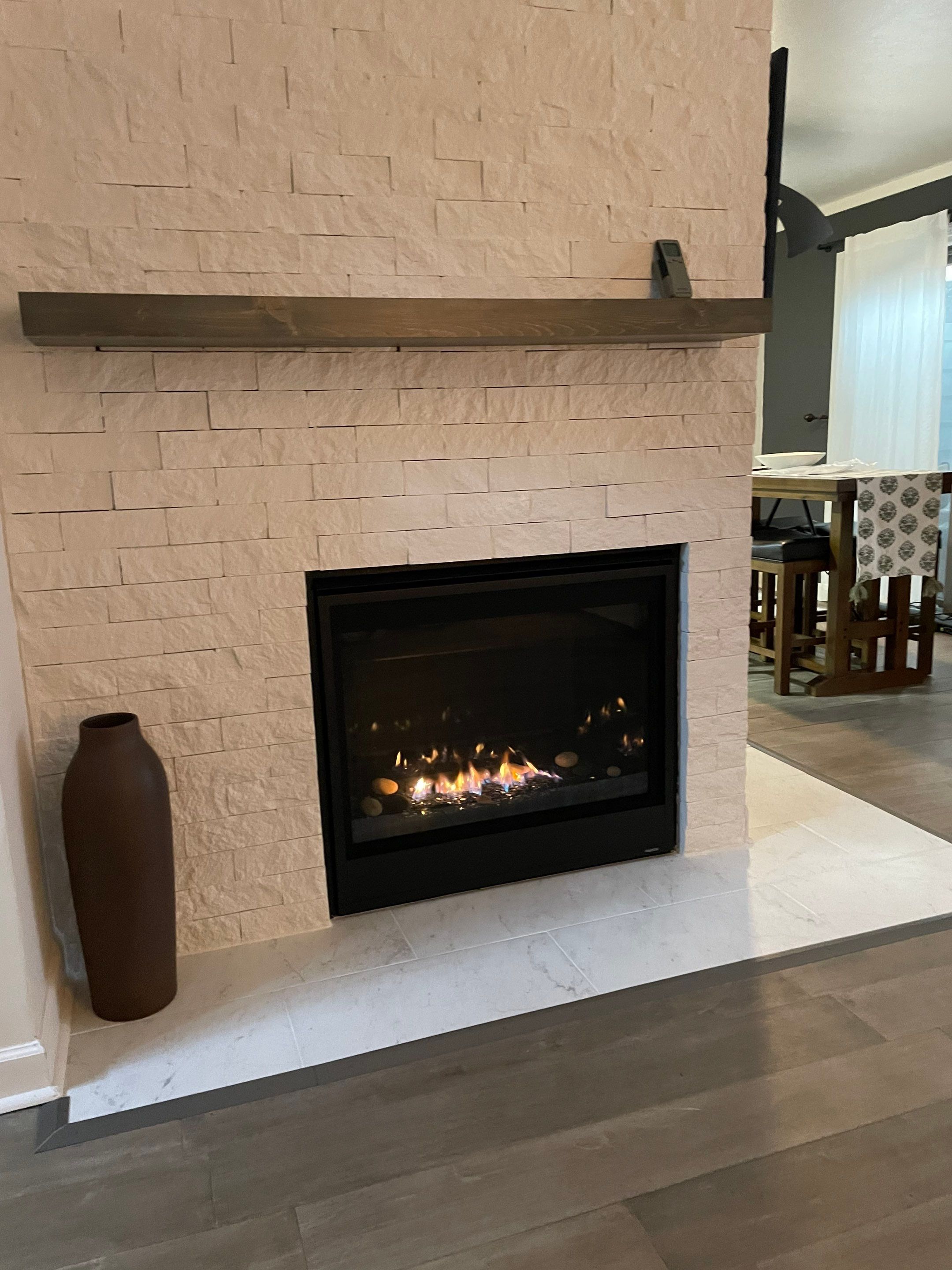 New Gas Fireplace  by Neighborhood Chimney Services 