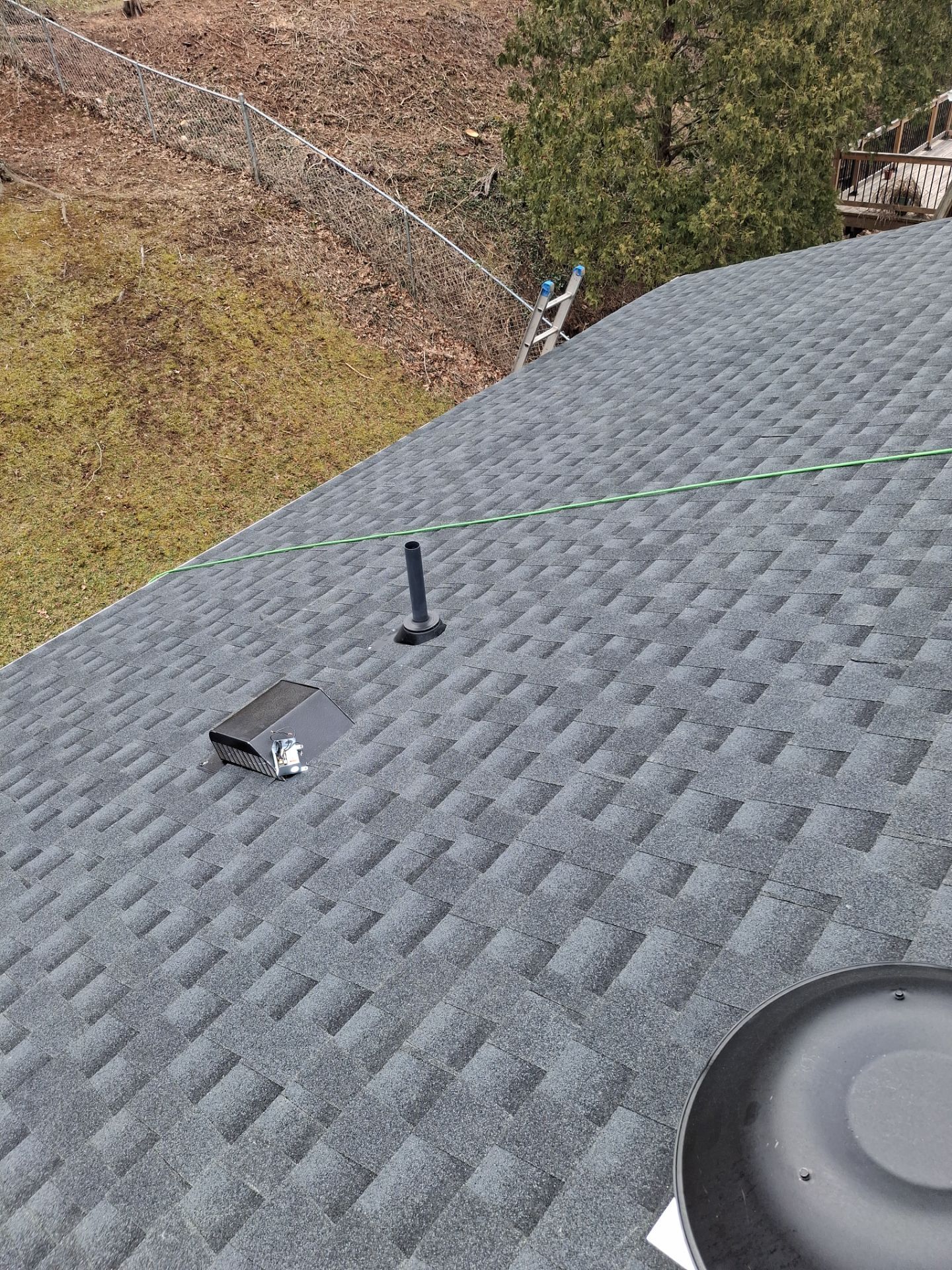 Residential Roofing Installation using GAF Timberline HDZ Charcoal by Rainstoppers Roofing