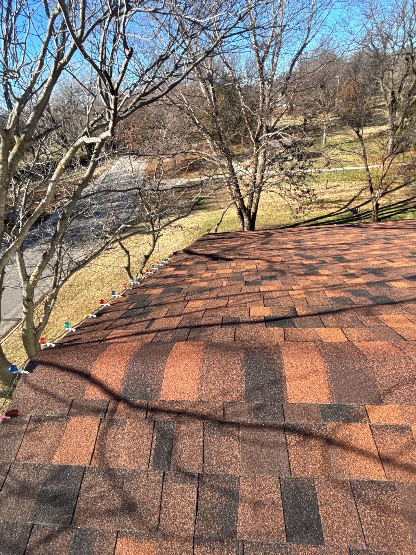 Storm Damaged Roof & Gutter Replacement by Eaton Roofing 