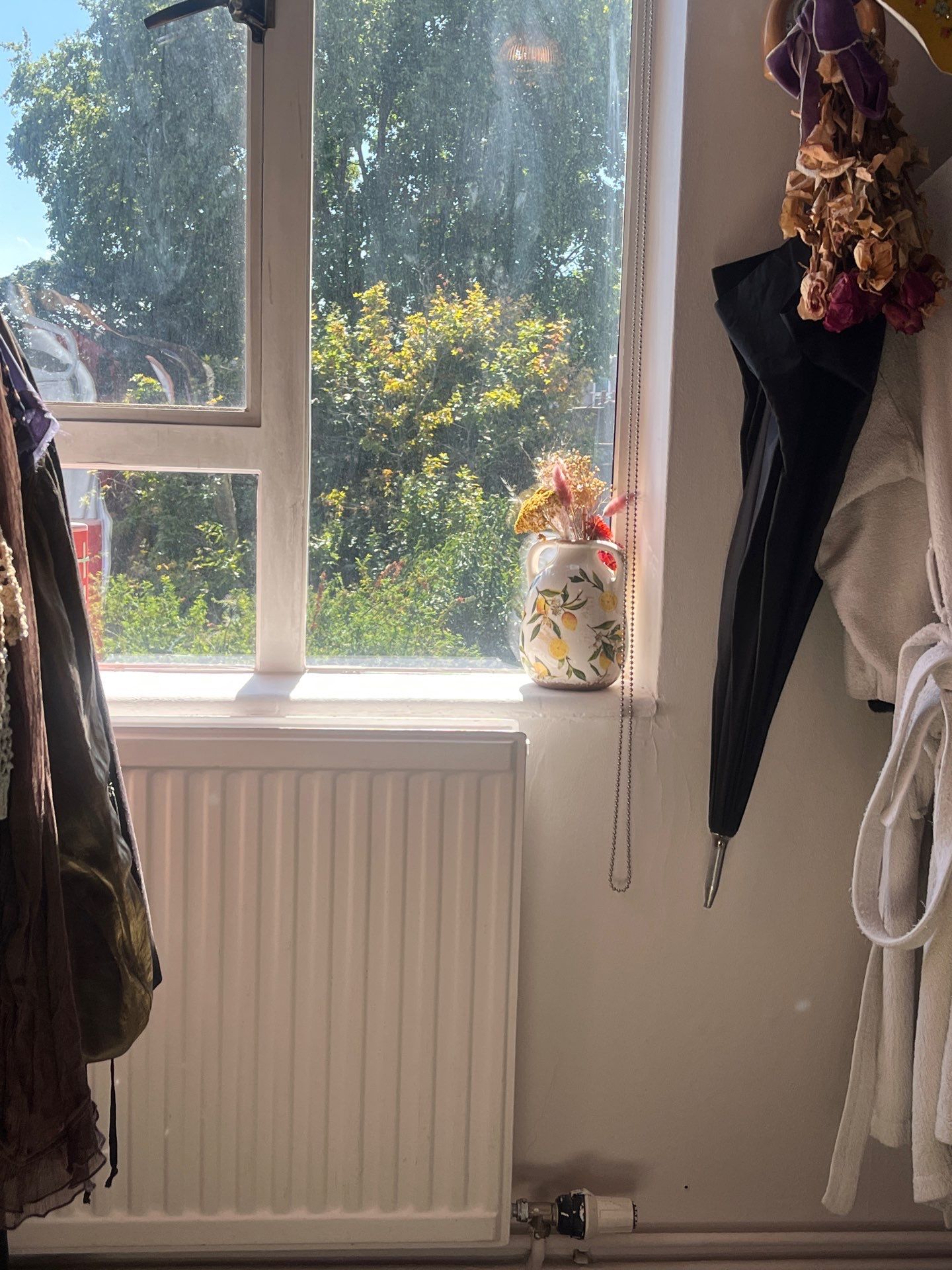 White Casement Window Installation with Black Metal Hardware in England by CompanyCam Sales Demo