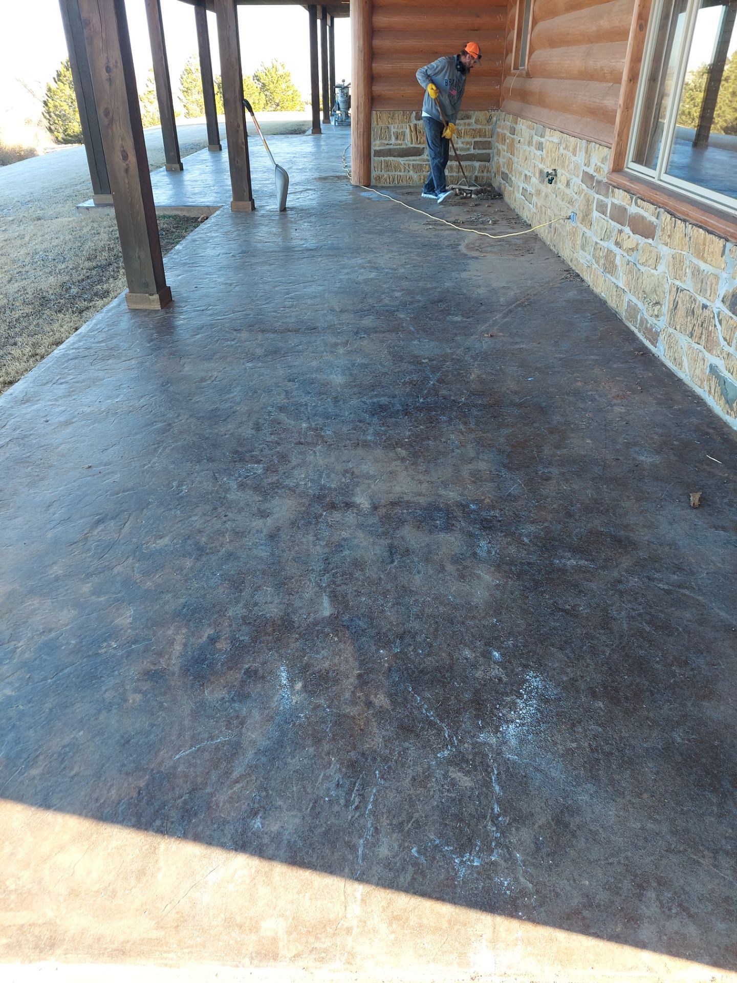 Patio Coating Installation with Chestnut by Copperhead Coatings