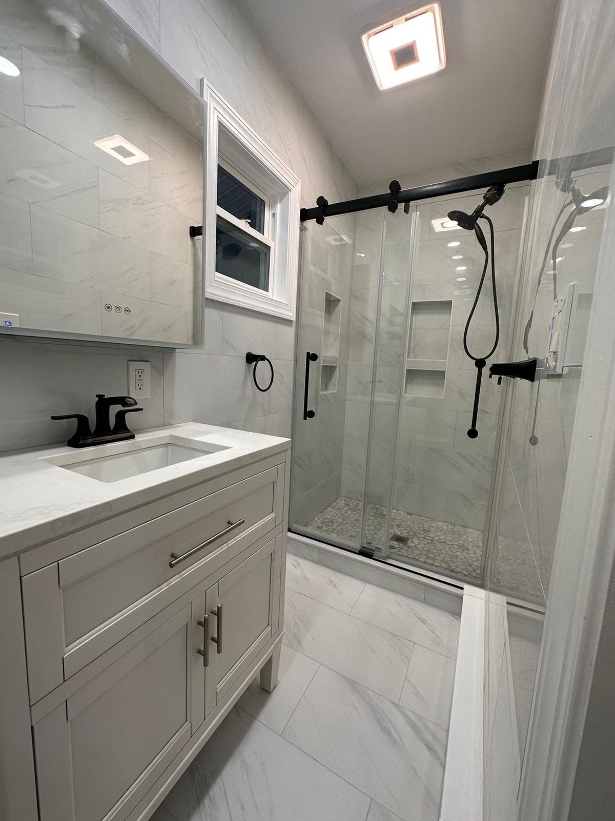 Bathroom Remodel using Tile by Home Concepts Construction