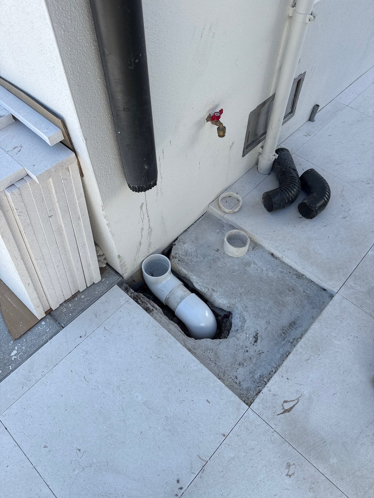 Seamless Aluminum Gutter Installation using black seamless gutters in Sarasota FL by Gutter Professors