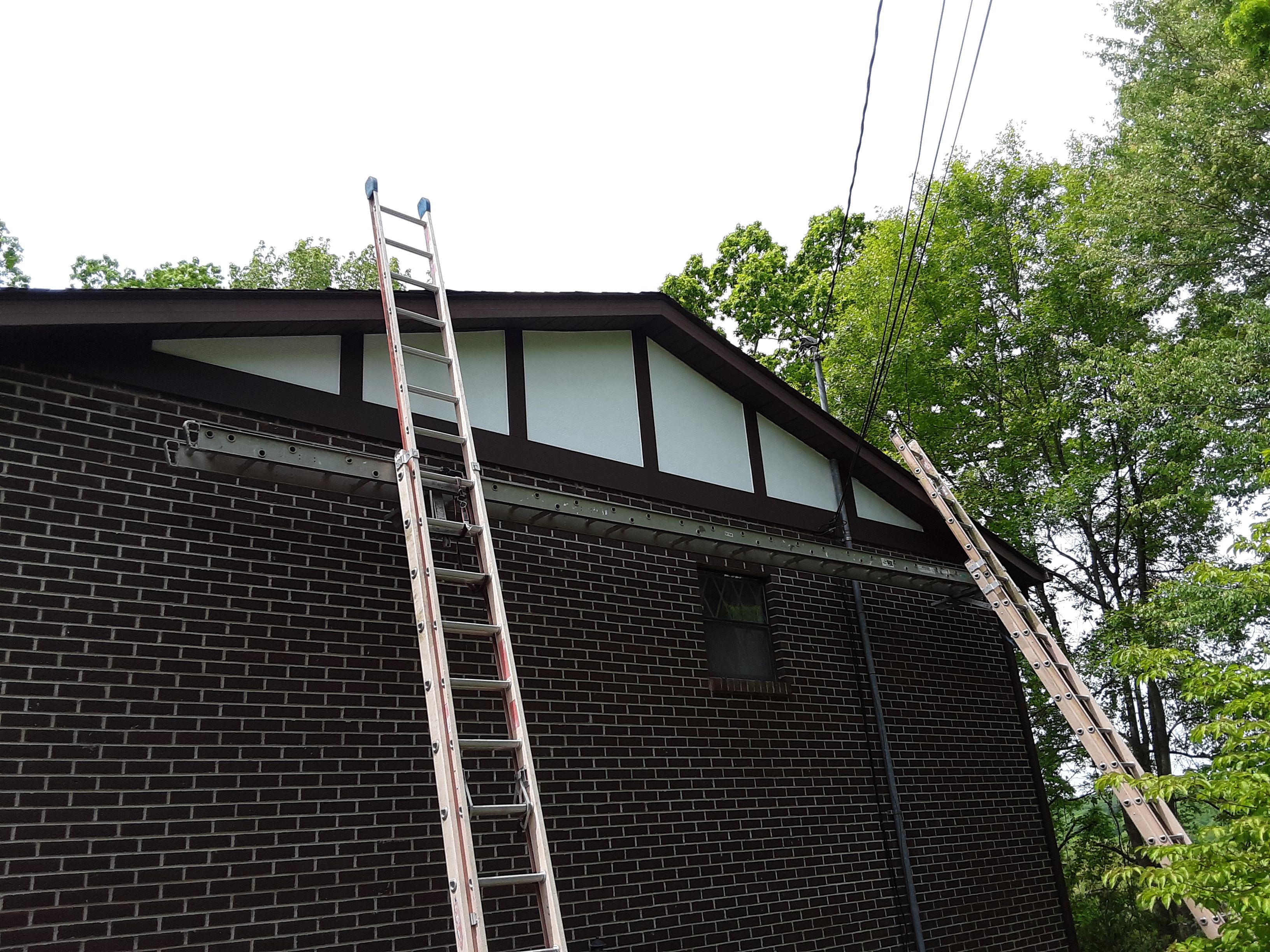 Old to New Tudor Style Fiber Cement Update  by Secure Construction Company Inc